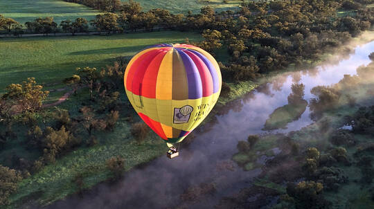 Sunrise Hot Air Balloon Flight and Champagne Breakfast